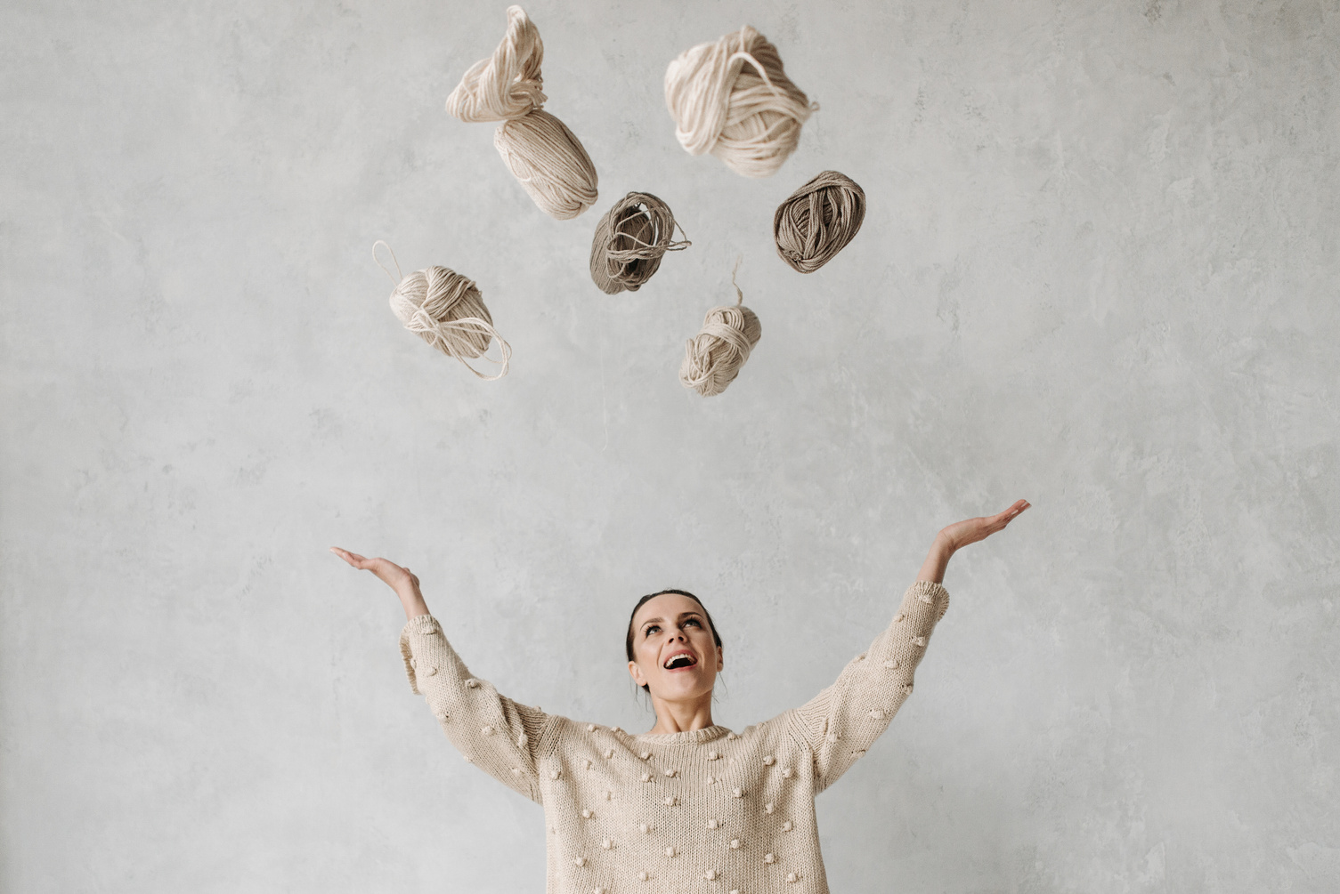 Woman Throwing Yarns